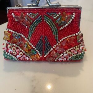 Vibrant Red Beaded Clutch with Floral Design